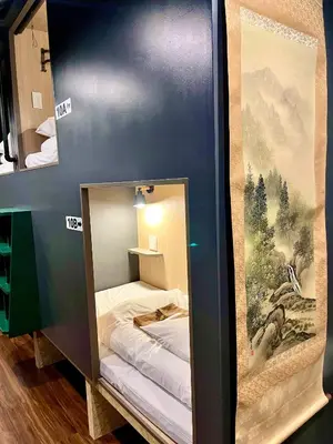 a small room with a bunk bed in it at Yoroi Asakusa Hotel in Tokyo