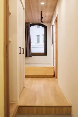 a hallway of a house with a window at SUNRISE STAY Asakusa in Tokyo