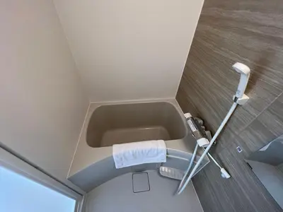 a small bathroom with a sink in the ceiling at kitashijyuku in Tokyo
