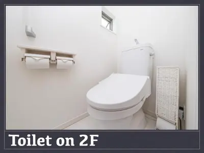 a bathroom with a toilet and two rolls of toilet paper at Horikiri House, 3-story home, 15 guests, Free parking, 103sqm in Tokyo