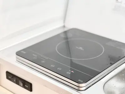 a tablet sitting on top of an electronic device at Kojima House 1F-TT0168 in Tokyo