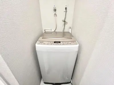 a toilet in the corner of a bathroom at Kojima House 1F-TT0168 in Tokyo