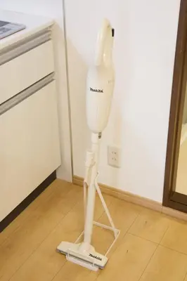 a white appliance standing on a floor in a room at Emilio301 in Tokyo