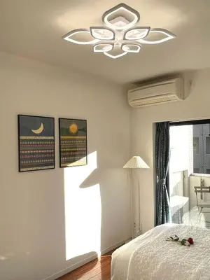 a bedroom with a ceiling fan and a bed at #5 WiFi無料&東新宿4分!歌舞伎町のホテルライク清潔部屋! in Tokyo