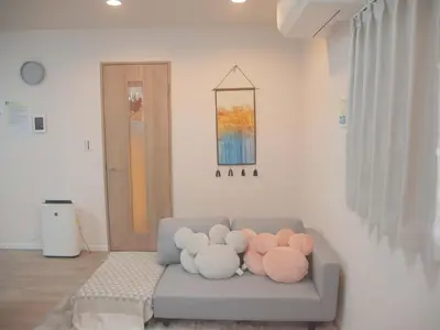 a bunch of stuffed animals sitting on a couch at \u65e5\u548c komagome in Tokyo