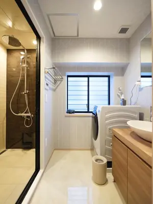 a bathroom with a toilet and a sink at T-home\u96c6 T-home SHU in Tokyo