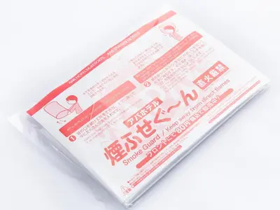 a plastic package with red and white text at APA Hotel Omori Ekimae Higashi in Tokyo