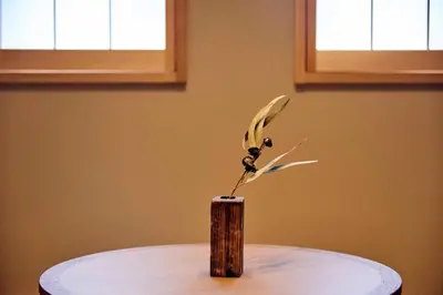 a small plant sitting on top of a table at MKG HOTEL Asakusa in Tokyo