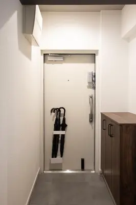 a room with a door with aabinet at NIYS apartments 56type in Tokyo