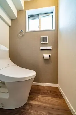 a bathroom with a toilet and a window at Kokoon Hotel Yotugi in Tokyo