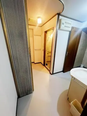 a bathroom with a toilet and a sink at \u70df\u96e8\u8f69 303 in Tokyo