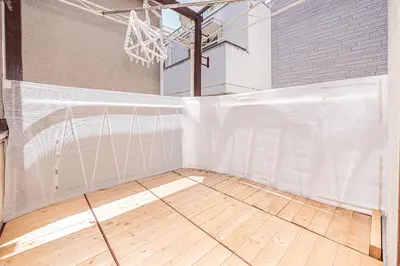 a basketball court with a net and a hoop at Screamer 2 Hostel in Tokyo
