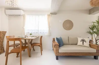 a living room with a table and a couch at Cloud Nine Apartment Sky Tree in Tokyo