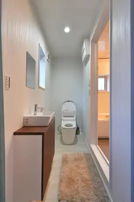 a bathroom with a white toilet and a sink at XQC2253 Sensoji Temple, newly built building with complete facilities in Tokyo