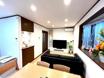 a small living room with a television and a table at TSURUNOYA The only private lodging in Tokyo Japanese Tatami style 8 minutes walk from station free Parking new open Asakusa Akihabara Tokyo sky tree Disneyland nearby 110m2 in Tokyo