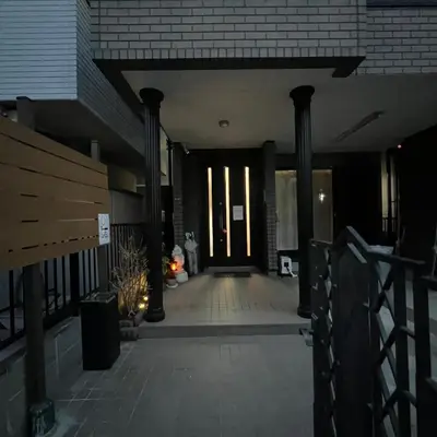 a hallway of a building with columns and a door at TSURUNOYA The only private lodging in Tokyo Japanese Tatami style 8 minutes walk from station free Parking new open Asakusa Akihabara Tokyo sky tree Disneyland nearby 110m2 in Tokyo