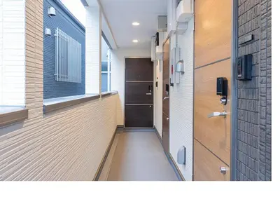 a hallway with a door and a window and a hallway sidx sidx sidx at \u3077\u3075\u304bTk\u6771\u5411\u5cf6303-1min to Higashi Mukojima Sta 3F Cozy Stay Near Skytree Asakusa in Tokyo