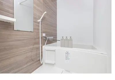 a bathroom with a white sink and a shower at \u3077\u3075\u304bTk\u6771\u5411\u5cf6303-1min to Higashi Mukojima Sta 3F Cozy Stay Near Skytree Asakusa in Tokyo
