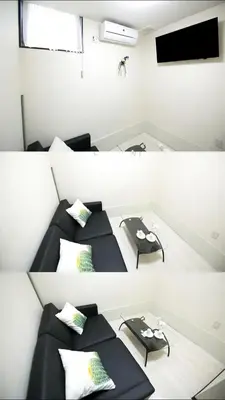 a room with two beds and a tv in it at \u677f\u6a4b\u99c5\u304b\u3089\u5f92\u6b692\u5206 3\u968e\u5efa\u3066\u548c\u5ba4\u3068\u30ed\u30d5\u30c8\u5b8c\u5099-\u7af9\u904a\u6797 in Tokyo