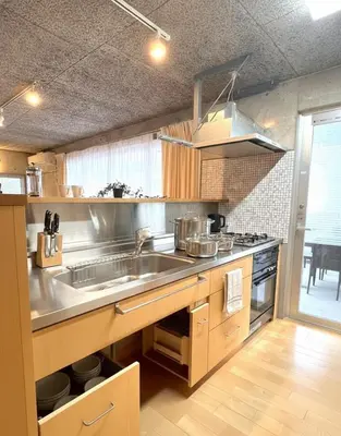 a kitchen with a sink and a stove at Sunshine in Tokyo