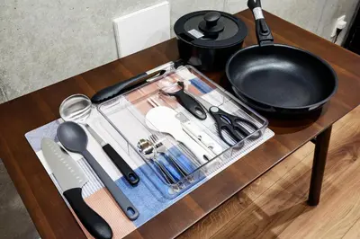 a table with a tray with utensils on it at Life Town Oshiage - Compact Stay - Steps from Skytree in Tokyo