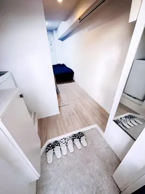 a room with four pairs of shoes on the floor at West Shinjuku Entire House with 2beds in Tokyo