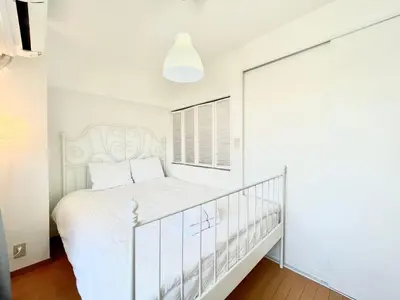 a bedroom with a white bed and a window at suny503-SJ0008 in Tokyo