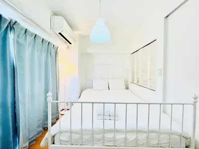 a white crib in a white bedroom with a window at suny503-SJ0008 in Tokyo