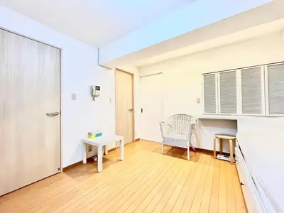 an empty living room with a table and a chair at suny503-SJ0008 in Tokyo