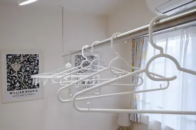 a white towel rack in a room with a window at 5min Tachiaigawa Station Max 4 Haneda 17min in Tokyo
