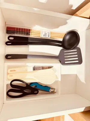 a drawer filled with lots of kitchen utensils at Hotel Axel Shinjuku in Tokyo