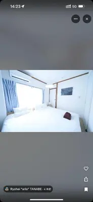 a bed in the middle of a room at househotel\u4e0a\u91ce \u5165\u8c37 in Tokyo