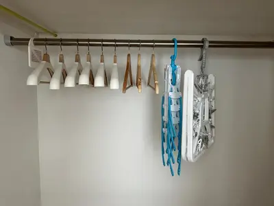 a group of toothbrushes are hanging on a rack at Fit-Inn Komagome JR Line and Komagome 2 min walk Direct access to Shinjuku Ikebukuro Shibuya Akihabara Ueno in Tokyo