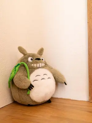 a stuffed animal with a face on a wall at \u6d45\u8349\u8907\u5f0f\u516c\u5bd3 \u6c11\u5bbf \u6700\u592710\u4eba \u6d45\u8349 \u6d45\u8349\u5bfa in Tokyo