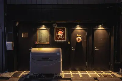 a room with a wall with two doors and a cpu at \u548c\u306e\u5bbf\u30db\u30c6\u30ebYamatoinn Akihabara#301 in Tokyo