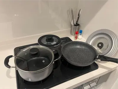 a pan sitting on top of a stove at Skytree 13 minute drive Exclusive whole home stay in Tokyo