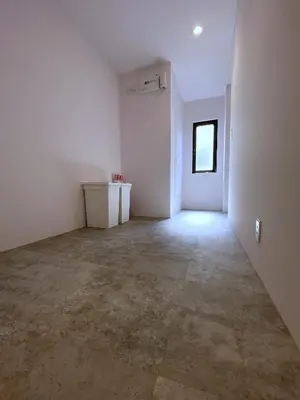 an empty room with white walls and a window at MY House YANESEN Tokyo2 in Tokyo