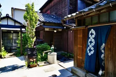 a house with a sign in front of it at MY House YANESEN Tokyo in Tokyo