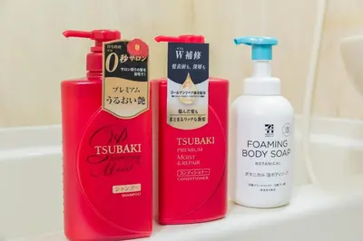 three bottles of bathroom products sitting on a sink at FRt\u6075\u6bd4\u5bff2\u4e01\u76ee303 in Tokyo