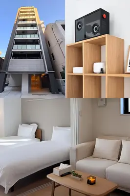 a room with a bed and a speaker and a building at Asakusa 1001 Deluxe Double Room in Tokyo