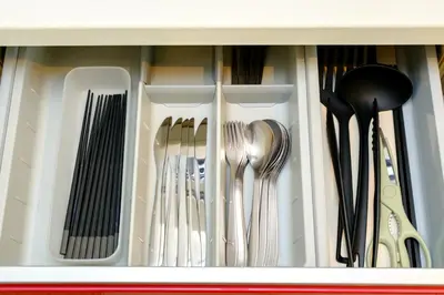 a drawer filled with forks and spoons and utensils at Penthouse Apartment with Skytree View - 94sqm Luxury Suite - Miilo ASAKUSA EAST in Tokyo