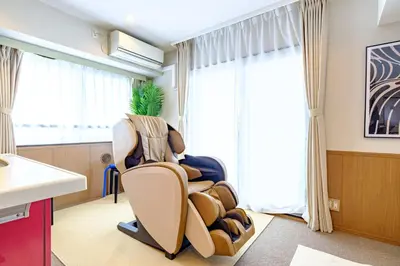 a dentist room with a chair in front of a window at Penthouse Apartment with Skytree View - 94sqm Luxury Suite - Miilo ASAKUSA EAST in Tokyo