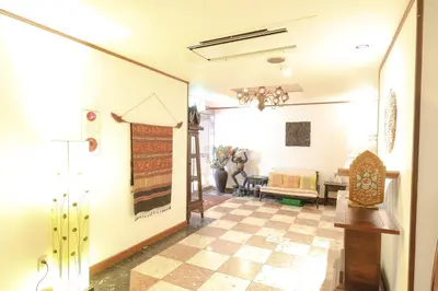 a hallway of a house with a living room at HOTEL B-Girl in Tokyo
