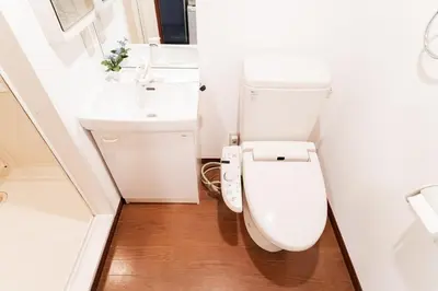 a bathroom with a toilet and a sink at Shinjuku ,2 minutes from the station in Tokyo