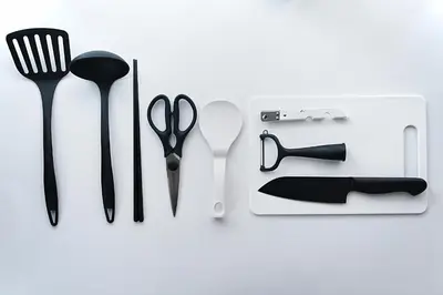 a group of utensils sitting on a white table at Latte Urban Elegance Kinshicho, 5min walk to Station in Tokyo