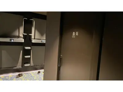 a close up of a stainless steel refrigerator at GLANSIT AKIHABARA