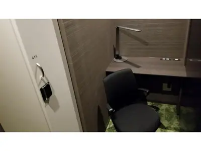 a room with a desk and a chair next to a desk at GLANSIT AKIHABARA