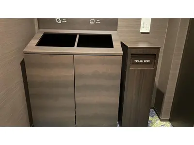 a kitchen with a sink and a counter top at GLANSIT AKIHABARA