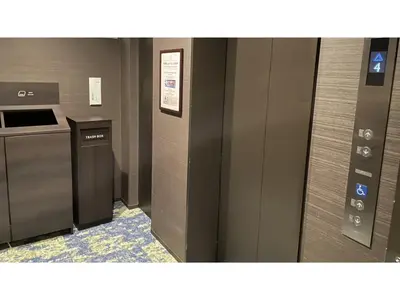 an elevator in an office building with a walk at GLANSIT AKIHABARA