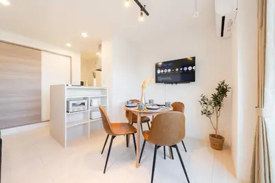 a kitchen and dining room with a table and chairs at House hotel EKODA 301 HE31 in Tokyo